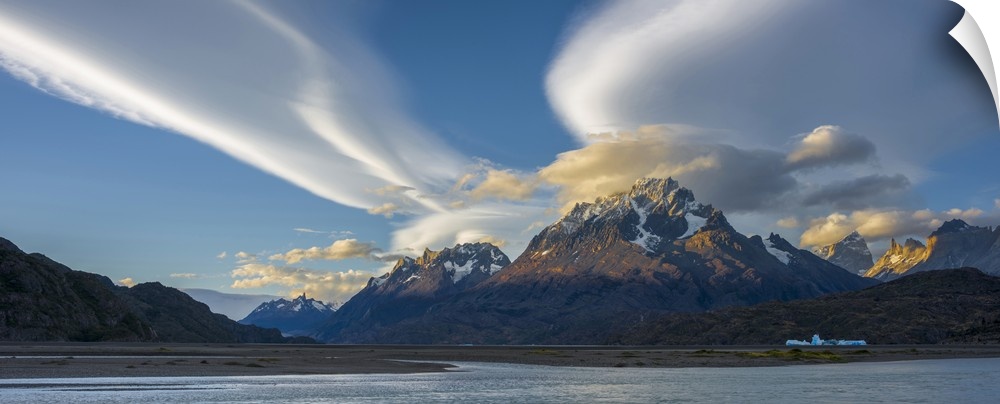 Lenticular clouds over mountain peaks, Grey Lake, Torres Del Paine National Park, Chile.
