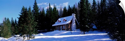 Log House in Winter Laurentides Quebec Canada