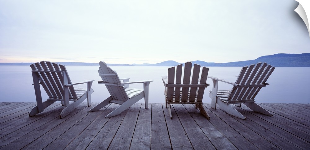Adirondack chair art of four chairs at the edge of a dock on a misty lake in summer.