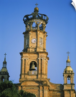 Low angle view of a bell tower of a cathedral, Cathedral of Our Lady of Guadalupe, Puerto Vallarta, Mexico