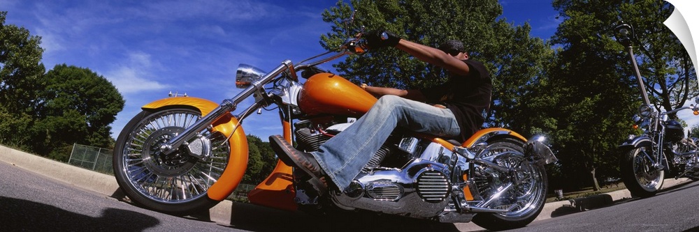 Low angle view of a man riding a motorcycle, Wisconsin