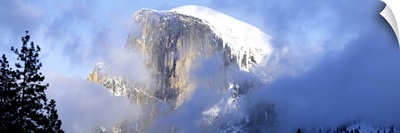 Low angle view of a mountain covered with snow, Half Dome, Yosemite National Park, California