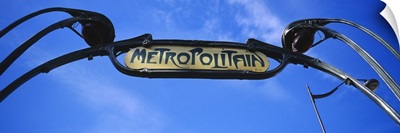 Low angle view of a signboard of a subway station, Paris, France
