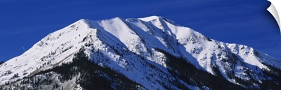 Low angle view of a snow covered mountain, Rocky Mountains, Twin Lakes, Colorado