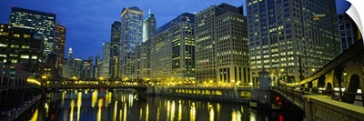 Low angle view of buildings lit up at night, Chicago River, Chicago, Illinois