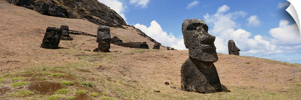 Low angle view of Moai statues, Tahai Archaeological Site, Rano Raraku, Easter Island, Chile