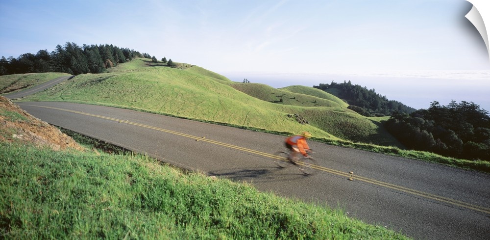 Man riding a bicycle, Bolinas Ridge, Marin County, California