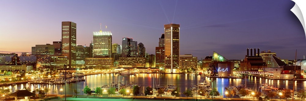 Wall art for the office or living room this is a panoramic photograph of the Inner Harbor and downtown as the sun sets.