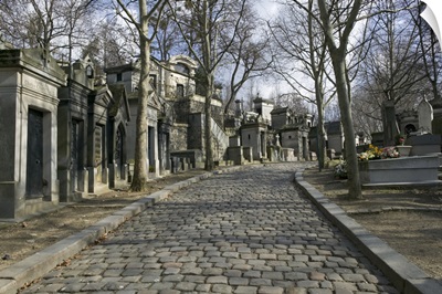 Monuments on the side of a path, Pere-Lachaise Cemetery, Avenue des Acacias Paris, France