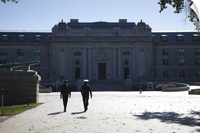Naval cadets walking in front of a building, Tecumseh Court, US Naval Academy