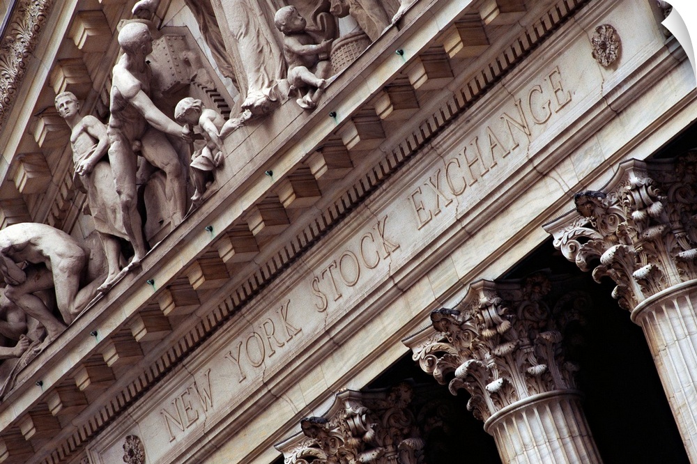 This wall art is a photograph of the architectural detail of this financial institution showing a close up of the frieze i...