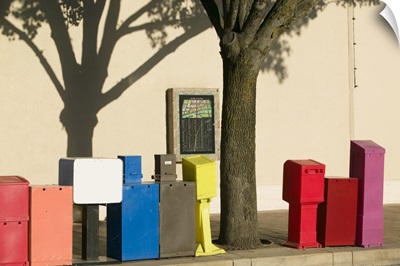 Newspaper boxes in a row at a footpath, Country Club Plaza, Kansas City, Missouri