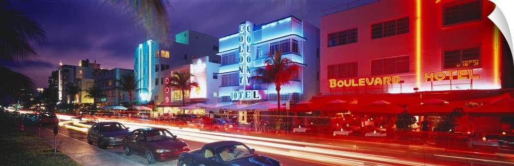 Long horizontal photo print of a busy and lit up street in Miami.