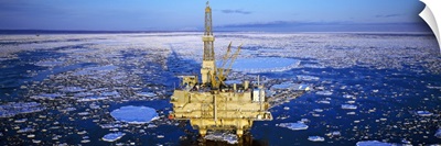 Oil production platform in icy water, Cook Inlet, Trading Bay, Alaska