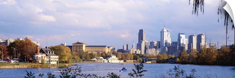 This panoramic photograph includes a view of the city skyline, the art museum, and the Schuylkill River shore.