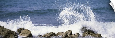 Puerto Rico, Vieques, Water splashing with rocks on the beach
