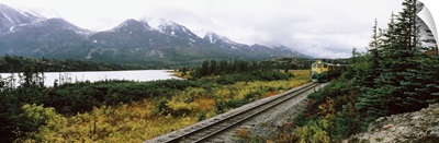 Railroad track passing through a landscape, Yukon Railroad, Summit Lake, White Pass, Alaska