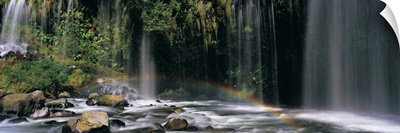 Rainbow in front of a waterfall in a forest, Dunsmuir, Siskiyou County, California