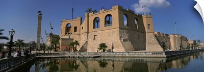 Reflection of a building in a pond, Assai Al Hamra, Tripoli, Libya