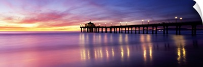 Reflection of a pier in water, Manhattan Beach Pier, Manhattan Beach, San Francisco, California