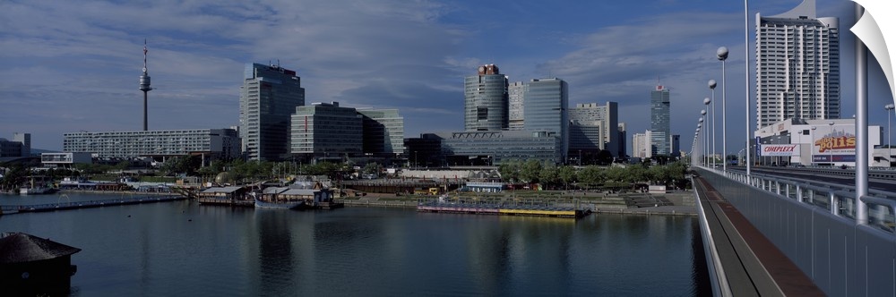 Reflection of buildings in a river, Danube River, Vienna International Center, Vienna, Austria