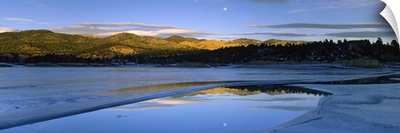 Reflection of moon in water, Canyon Ferry Lake, US Glacier National Park, Montana