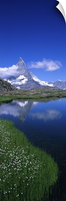 Reflection of mountain in water, Riffelsee, Matterhorn, Switzerland