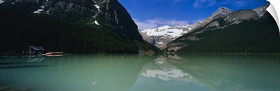 Reflection of mountains in water, Lake Louise, Banff National Park, Alberta, Canada