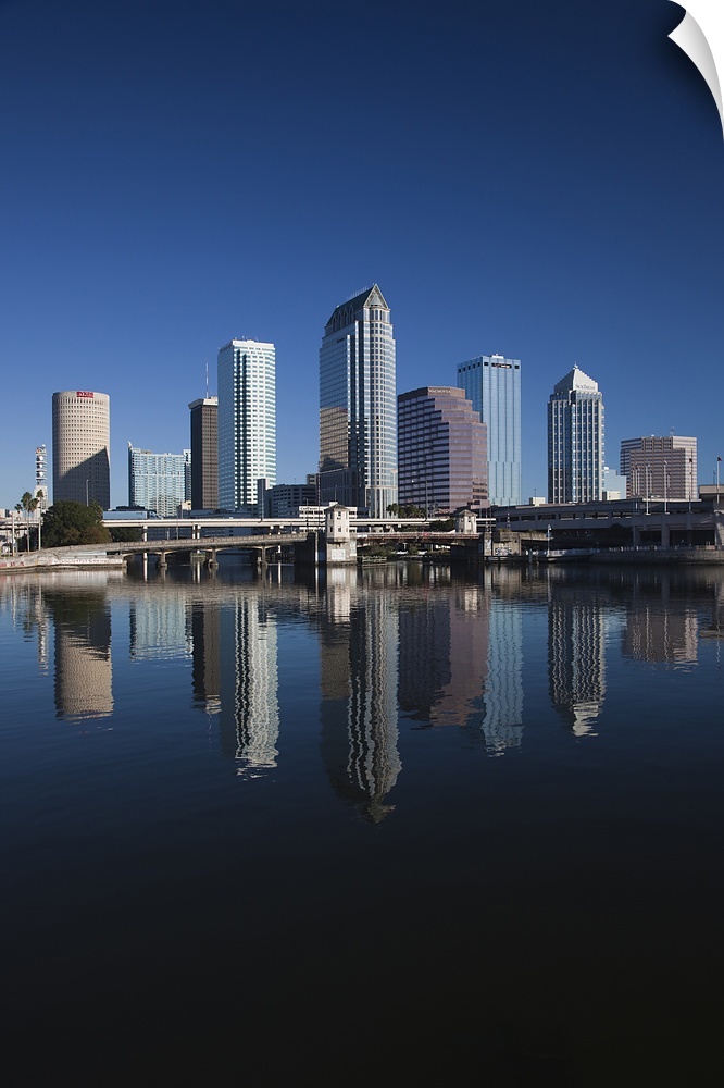 Tall image on canvas of buildings in Tampa reflected in the waterfront.