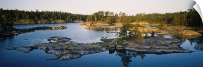 Reflection of trees on water, Archipelago, Baltic Sea, Sodermanland, Sweden