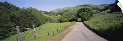 Road passing through a landscape, California