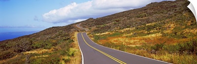 Road passing through hills, Maui, Hawaii
