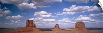 Rock formations on a landscape, The Mittens, Monument Valley, Arizona