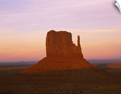Rock formations on a landscape, West Mitten, Monument Valley Tribal Park, Navajo, Arizona