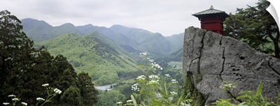 Rock in front of a valley, Yamadera, Yamagata Prefecture, Honshu, Japan