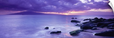 Rocks on coast at sunset, Maui, Hawaii