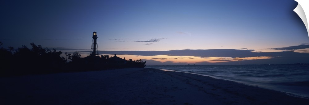 Wide angle photograph on a large canvas of the shoreline at Sanibel Island, in the darkness of early dawn, the Sanibel Isl...