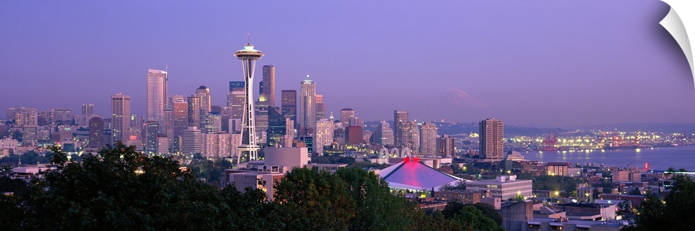Panoramic view of the Seattle, Washington skyline in the early evening, with the Space needle clearly visible in the cente...
