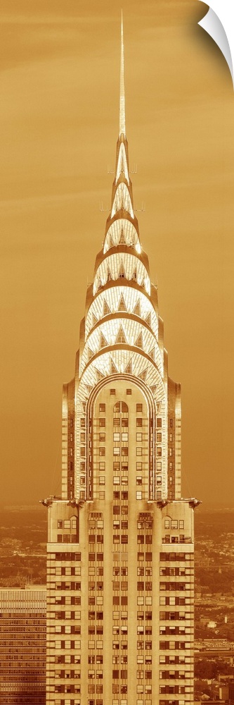 This is a sepiatone close up of the Chrysler Building at sunset. It is the view from 42nd Street and 5th Avenue.