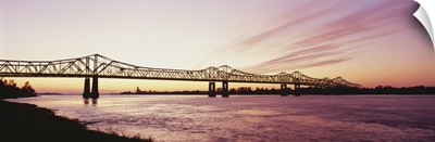 Silhouette of a bridge over a river, Crescent City Connection Bridge, Mississippi River, Natchez, Mississippi