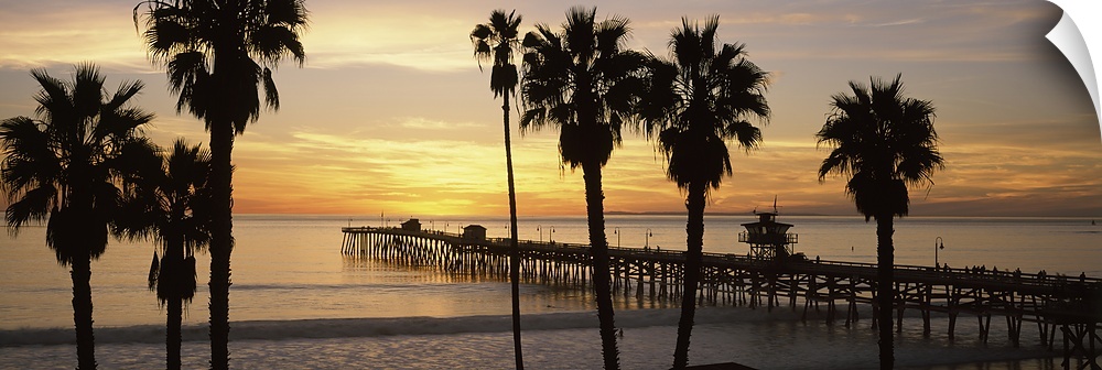 Panoramic image of the San Clemente Pier at sunset in Los Angeles, California.