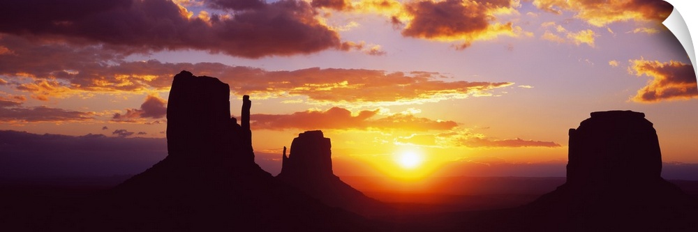 Silhouette of buttes at sunset, Monument Valley, Utah, USA