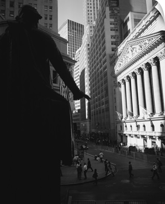 Silhouette of George Washington statue in front of a financial building, New York Stock Exchange, Wall Street, Times Square, Manhattan, New York City, New York State