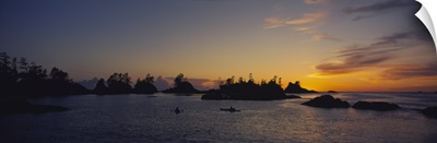 Silhouette of kayaks in the sea, Clayoquot Sound, Vancouver Island, British Columbia, Canada