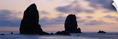 Silhouette of rocks at sunset, Cannon Beach, Oregon