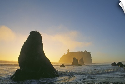 Silhouetted Sea Stacks In Pacific Ocean