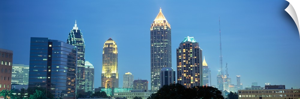 The Atlanta skyline is illuminated and photographed in panoramic view.