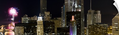 Skyscrapers and firework display in a city at night, Lake Michigan, Chicago, Illinois,