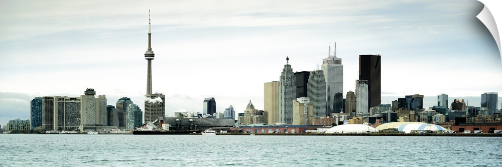 This decorative accent is a panoramic photograph of the downtown city skyline taken from across the water.