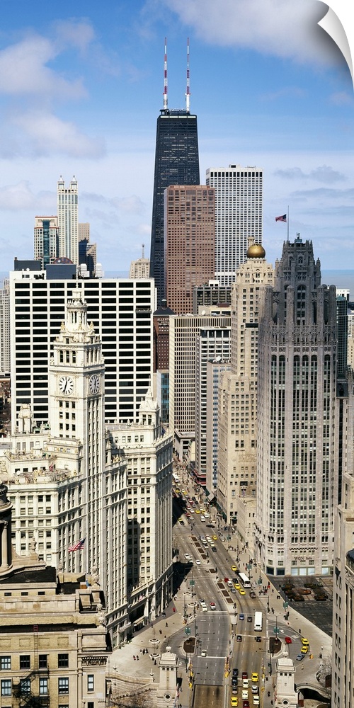 Michigan Avenue is pictured from above with a high angle view of the skyscrapers in the city.